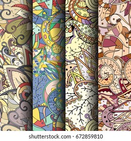 Set of tracery colorful seamless patterns. Vertical stripes. Curved doodling backgrounds for textile or printing with mehndi and ethnic motives. Vector