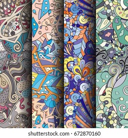 Set of tracery colorful seamless patterns. Vertical stripes. Curved doodling backgrounds for textile or printing with mehndi and ethnic motives. Vector