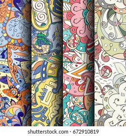 Set of tracery colorful seamless patterns. Vertical stripes. Curved doodling backgrounds for textile or printing with mehndi and ethnic motives. Vector