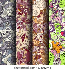 Set of tracery colorful seamless patterns. Vertical stripes. Curved doodling backgrounds for textile or printing with mehndi and ethnic motives. Vector