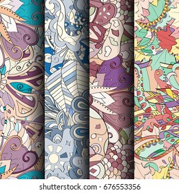 Set of tracery colorful seamless patterns. Vertical stripes. Curved doodling backgrounds for textile or printing with mehndi and ethnic motives. Vector