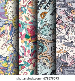 Set of tracery colorful seamless patterns. Vertical stripes. Curved doodling backgrounds for textile or printing with mehndi and ethnic motives. Vector