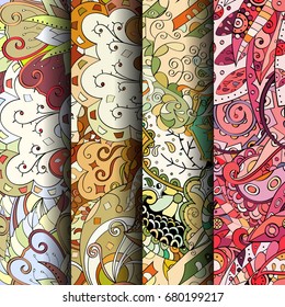 Set of tracery colorful seamless patterns. Vertical stripes. Curved doodling backgrounds for textile or printing with mehndi and ethnic motives. Vector