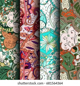 Set of tracery colorful seamless patterns. Vertical stripes. Curved doodling backgrounds for textile or printing with mehndi and ethnic motives. Vector