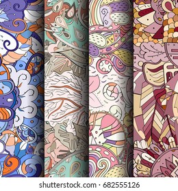 Set of tracery colorful seamless patterns. Vertical stripes. Curved doodling backgrounds for textile or printing with mehndi and ethnic motives. Vector