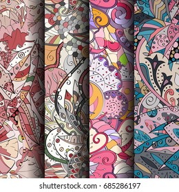 Set of tracery colorful seamless patterns. Vertical stripes. Curved doodling backgrounds for textile or printing with mehndi and ethnic motives. Vector
