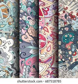 Set of tracery colorful seamless patterns. Vertical stripes. Curved doodling backgrounds for textile or printing with mehndi and ethnic motives. Vector