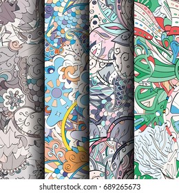 Set of tracery colorful seamless patterns. Vertical stripes. Curved doodling backgrounds for textile or printing with mehndi and ethnic motives. Vector