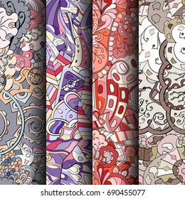Set of tracery colorful seamless patterns. Vertical stripes. Curved doodling backgrounds for textile or printing with mehndi and ethnic motives. Vector