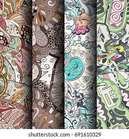 Set of tracery colorful seamless patterns. Vertical stripes. Curved doodling backgrounds for textile or printing with mehndi and ethnic motives. Vector