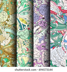 Set of tracery colorful seamless patterns. Vertical stripes. Curved doodling backgrounds for textile or printing with mehndi and ethnic motives. Vector