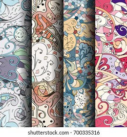 Set of tracery colorful seamless patterns. Vertical stripes. Curved doodling backgrounds for textile or printing with mehndi and ethnic motives. Vector