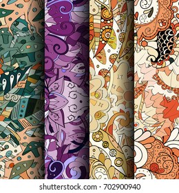 Set of tracery colorful seamless patterns. Vertical stripes. Curved doodling backgrounds for textile or printing with mehndi and ethnic motives. Vector