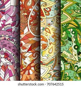 Set of tracery colorful seamless patterns. Vertical stripes. Curved doodling backgrounds for textile or printing with mehndi and ethnic motives. Vector