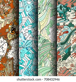 Set of tracery colorful seamless patterns. Vertical stripes. Curved doodling backgrounds for textile or printing with mehndi and ethnic motives. Vector
