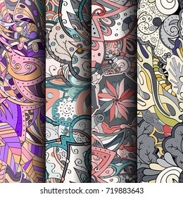 Set of tracery colorful seamless patterns. Vertical stripes. Curved doodling backgrounds for textile or printing with mehndi and ethnic motives. Vector