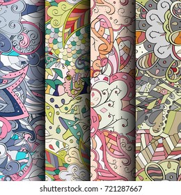 Set of tracery colorful seamless patterns. Vertical stripes. Curved doodling backgrounds for textile or printing with mehndi and ethnic motives. Vector