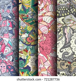 Set of tracery colorful seamless patterns. Vertical stripes. Curved doodling backgrounds for textile or printing with mehndi and ethnic motives. Vector