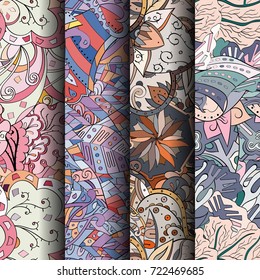 Set of tracery colorful seamless patterns. Vertical stripes. Curved doodling backgrounds for textile or printing with mehndi and ethnic motives. Vector