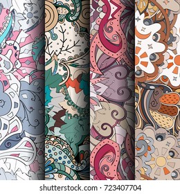 Set of tracery colorful seamless patterns. Vertical stripes. Curved doodling backgrounds for textile or printing with mehndi and ethnic motives. Vector