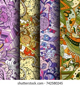 Set of tracery colorful seamless patterns. Vertical stripes. Curved doodling backgrounds for textile or printing with mehndi and ethnic motives. Vector