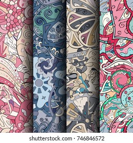 Set of tracery colorful seamless patterns. Vertical stripes. Curved doodling backgrounds for textile or printing with mehndi and ethnic motives. Vector