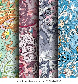 Set of tracery colorful seamless patterns. Vertical stripes. Curved doodling backgrounds for textile or printing with mehndi and ethnic motives. Vector