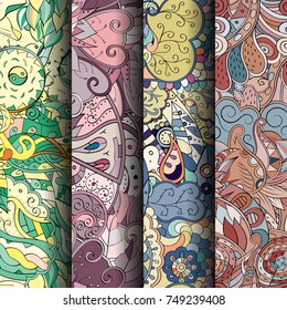 Set of tracery colorful seamless patterns. Vertical stripes. Curved doodling backgrounds for textile or printing with mehndi and ethnic motives. Vector
