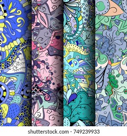 Set of tracery colorful seamless patterns. Vertical stripes. Curved doodling backgrounds for textile or printing with mehndi and ethnic motives. Vector