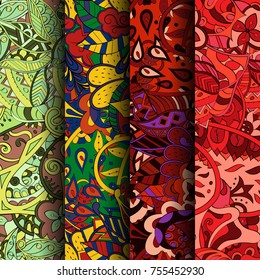 Set of tracery colorful seamless patterns. Vertical stripes. Curved doodling backgrounds for textile or printing with mehndi and ethnic motives. Vector