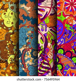 Set of tracery colorful seamless patterns. Vertical stripes. Curved doodling backgrounds for textile or printing with mehndi and ethnic motives. Vector