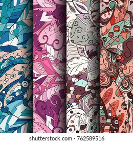 Set of tracery colorful seamless patterns. Vertical stripes. Curved doodling backgrounds for textile or printing with mehndi and ethnic motives. Vector