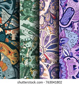 Set of tracery colorful seamless patterns. Vertical stripes. Curved doodling backgrounds for textile or printing with mehndi and ethnic motives. Vector