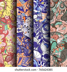 Set of tracery colorful seamless patterns. Vertical stripes. Curved doodling backgrounds for textile or printing with mehndi and ethnic motives. Vector