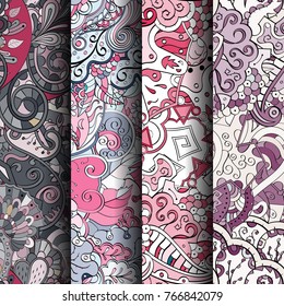Set of tracery colorful seamless patterns. Vertical stripes. Curved doodling backgrounds for textile or printing with mehndi and ethnic motives. Vector