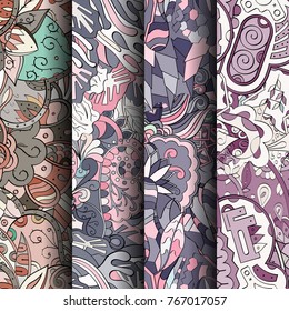 Set of tracery colorful seamless patterns. Vertical stripes. Curved doodling backgrounds for textile or printing with mehndi and ethnic motives. Vector