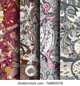 Set of tracery colorful seamless patterns. Vertical stripes. Curved doodling backgrounds for textile or printing with mehndi and ethnic motives. Vector