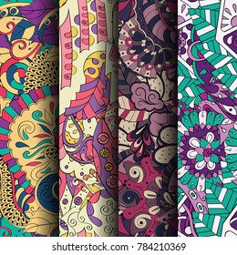 Set of tracery colorful seamless patterns. Vertical stripes. Curved doodling backgrounds for textile or printing with mehndi and ethnic motives. Vector