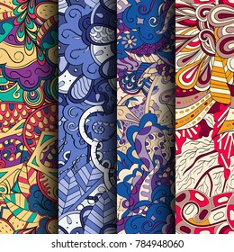 Set of tracery colorful seamless patterns. Vertical stripes. Curved doodling backgrounds for textile or printing with mehndi and ethnic motives. Vector