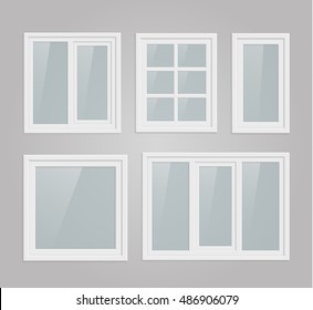 Set of transparent metal plastic windows on gray wall