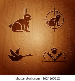 Set Trap hunting, Rabbit, Flying duck and Hunt on rabbit with crosshairs on wooden background. Vector