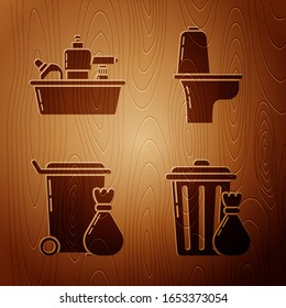 Poner la lata de basura y la bolsa de basura , Botellas de plástico para líquido lavavajillas líquido, Basura y Cuencos de inodoro sobre fondo de madera. Vector