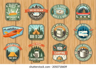 Set of travel inspirational quotes. Vector Concept for shirt or logo, print, stamp or tee. Vintage design with retro camping tea kettle, kayak, compass, primus, campfire silhouette. Camping quote.