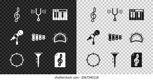 Set Treble clef, Musical tuning fork, synthesizer, Tambourine, Drum and drum sticks, Microphone and Xylophone icon. Vector
