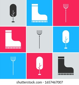 Set Tree, Waterproof rubber boot and Garden pitchfork icon. Vector