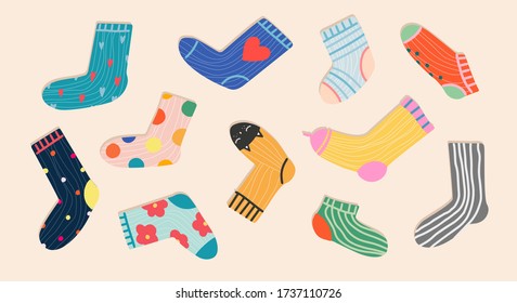 Set of trendy colorful socks. Hand-drawn accessories. Modern socks in different colours top down view. Cartoony design for web and print.