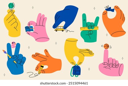 Set of trendy hands holding school supplies. Hand drawn isolated big hands with the colorful school bus, palette, brush, globe, ball, ruler, book, pen. Modern isolated illustrations, education concept