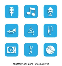 Set Triangle, Drum sticks, Vinyl disk, Audio jack, player with vinyl, Trumpet, Microphone and  icon. Vector