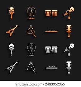 Set Triangle, Microphone, Drum and drum sticks, Electric bass guitar, Maracas and Treble clef icon. Vector