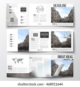 Set of tri-fold brochures, square design templates. Polygonal background, blurred image, urban landscape, modern stylish triangular vector texture.